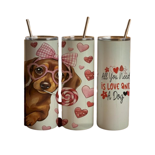 Three tumblers with dog-themed designs on a white background