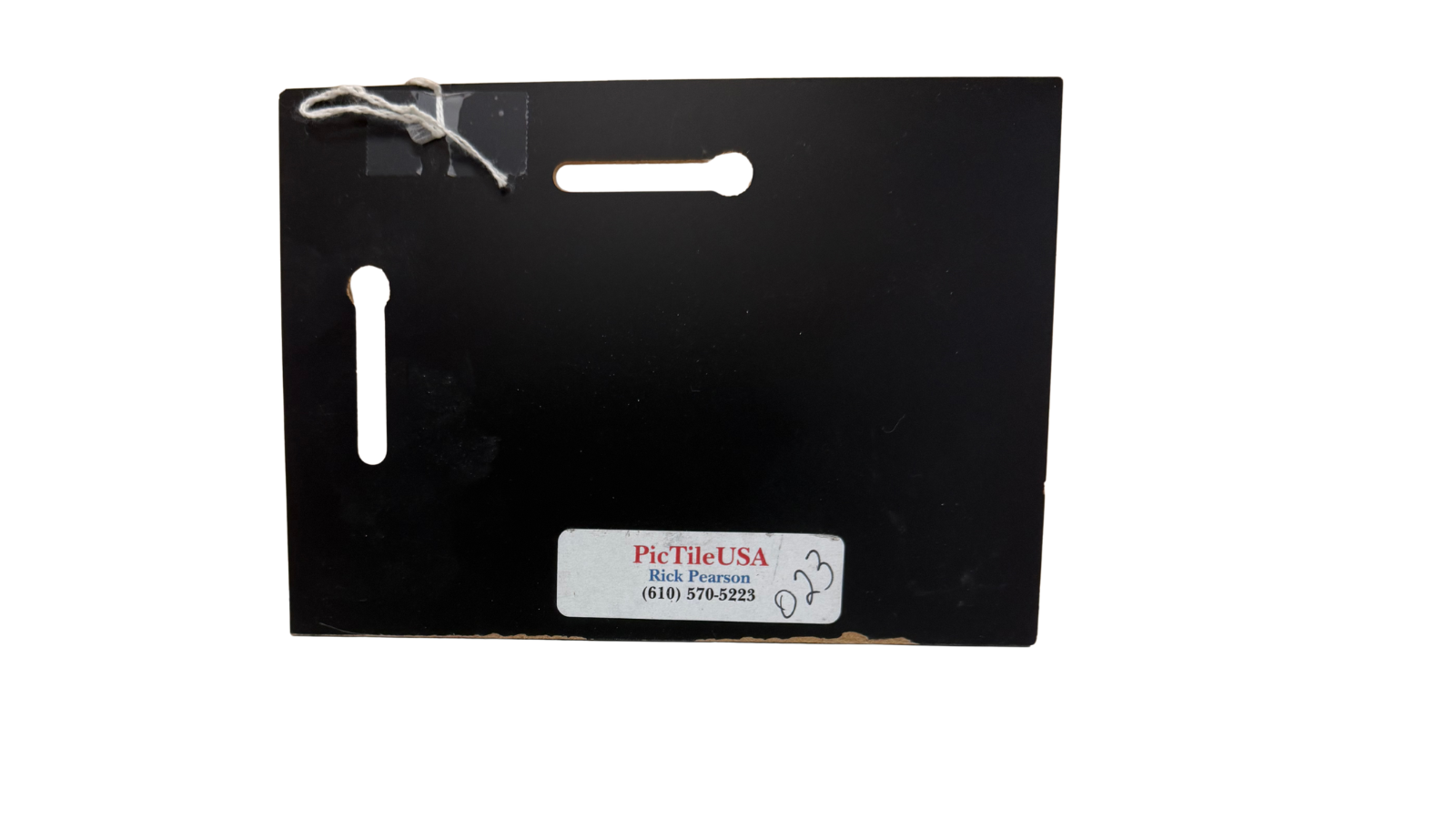 Black rectangular tile with a handle and 'PicTile USA' label on a white background