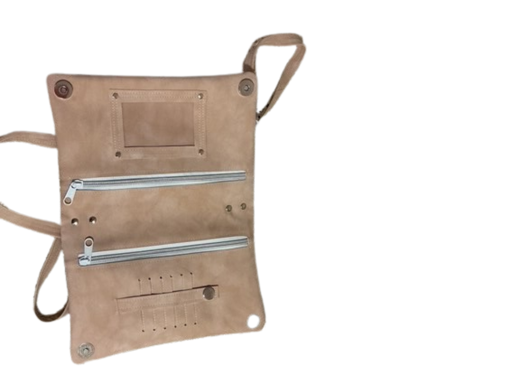 Beige leather bag with zippers on a white background