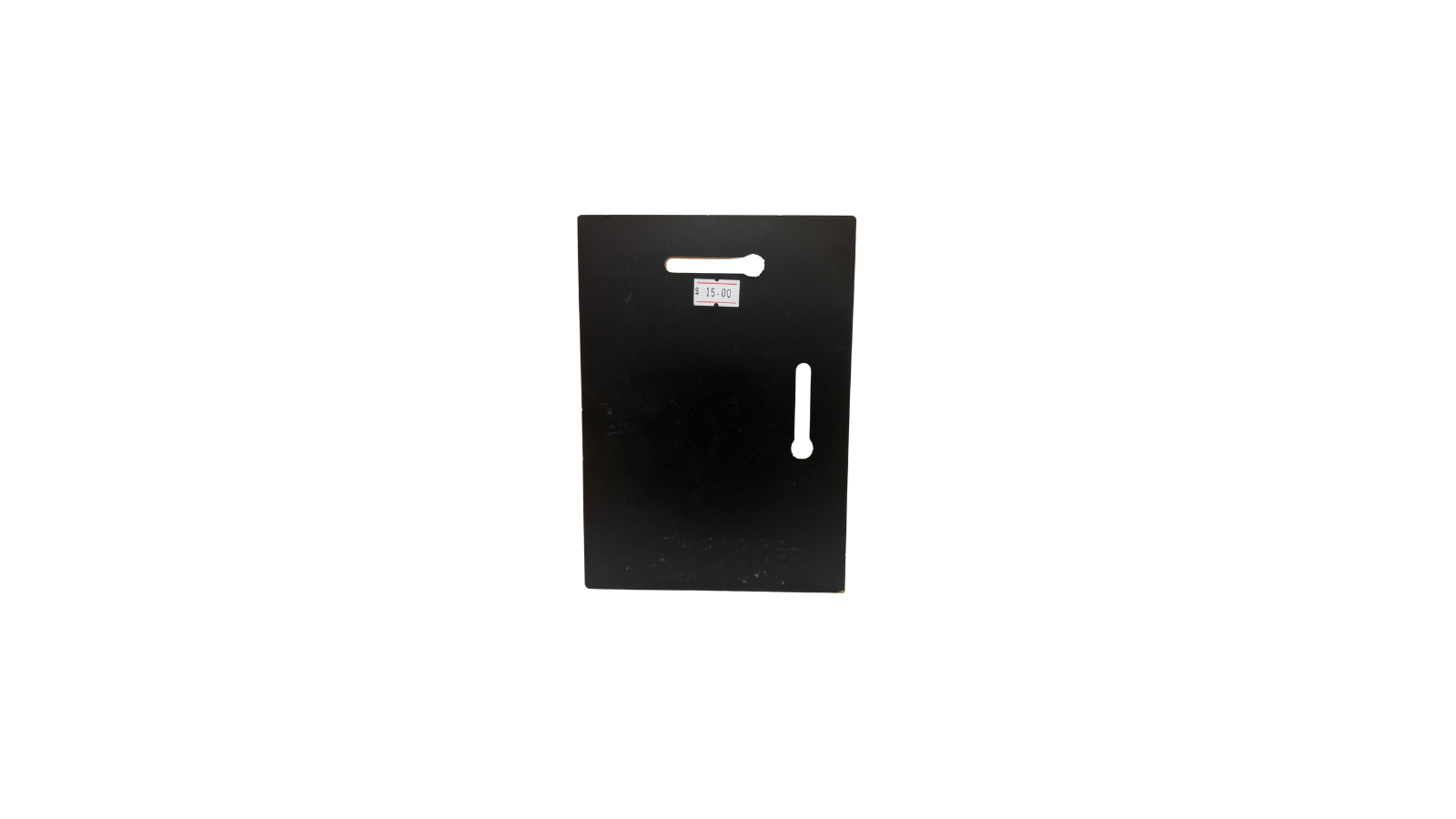 Black rectangular object with a white label on a white background