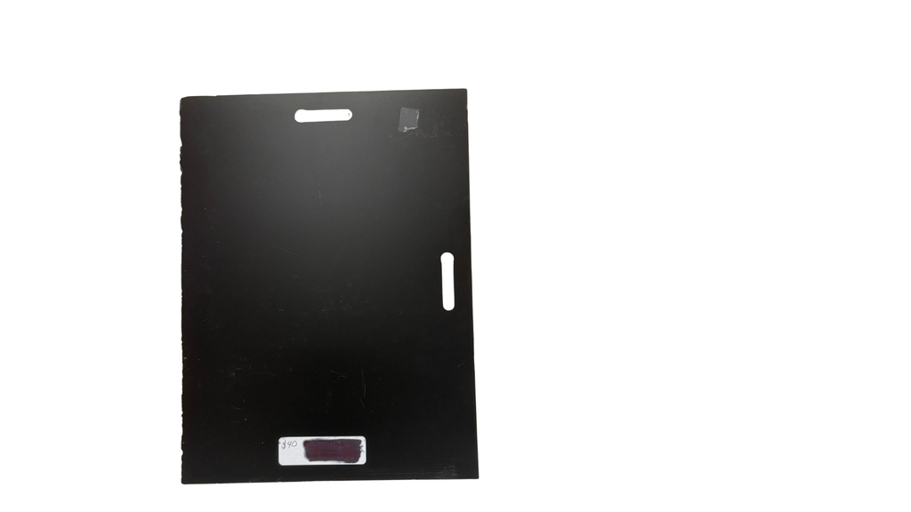 Black rectangular object with a small white handle on a white background