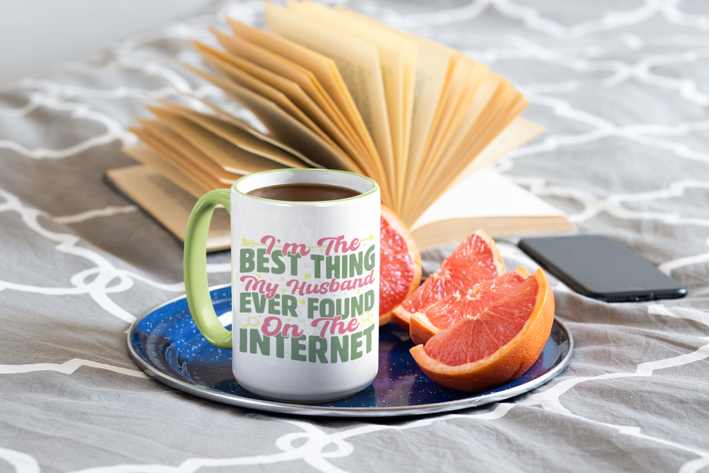 Mug with humorous text on a tray with fruit and phone, on a textured surface