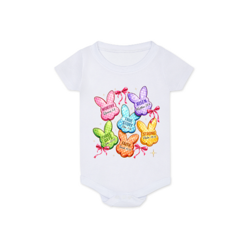 White baby onesie with colorful bunny designs and text on a white background