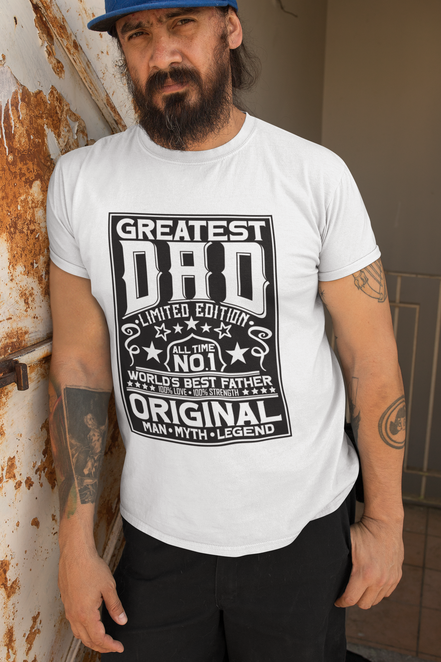 Man wearing a white t-shirt with 'Greatest Dad' text design.