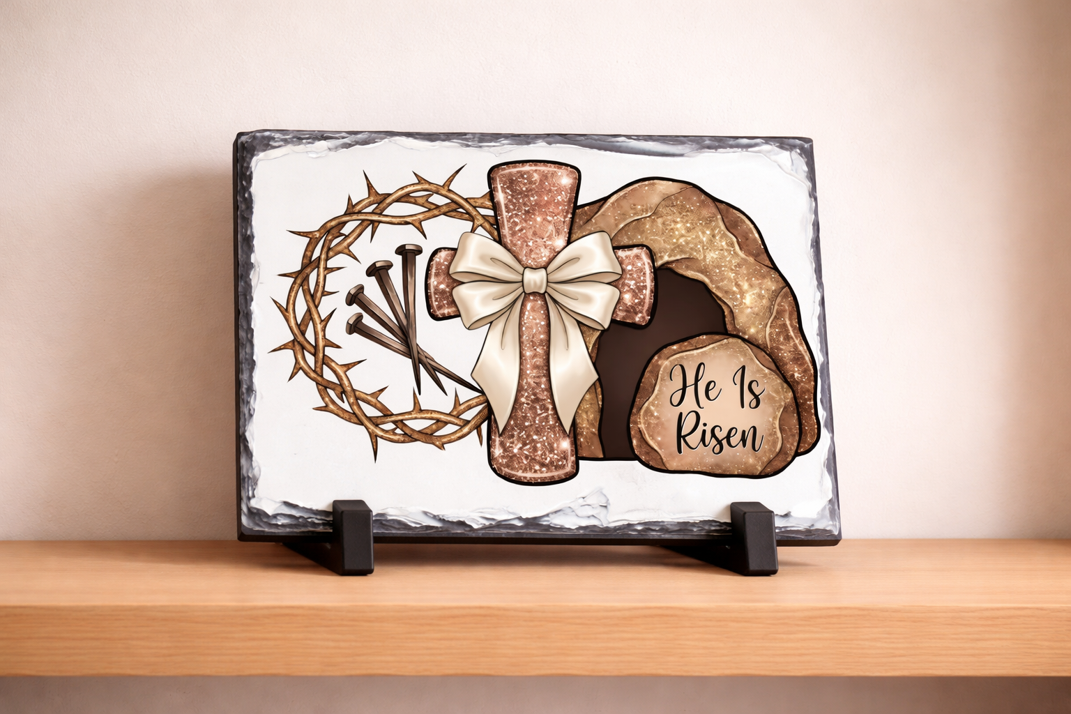 Decorative slate with religious symbols on a wooden shelf