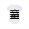 White baby onesie with black text on a white background