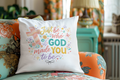Decorative pillow with inspirational quote on a floral couch