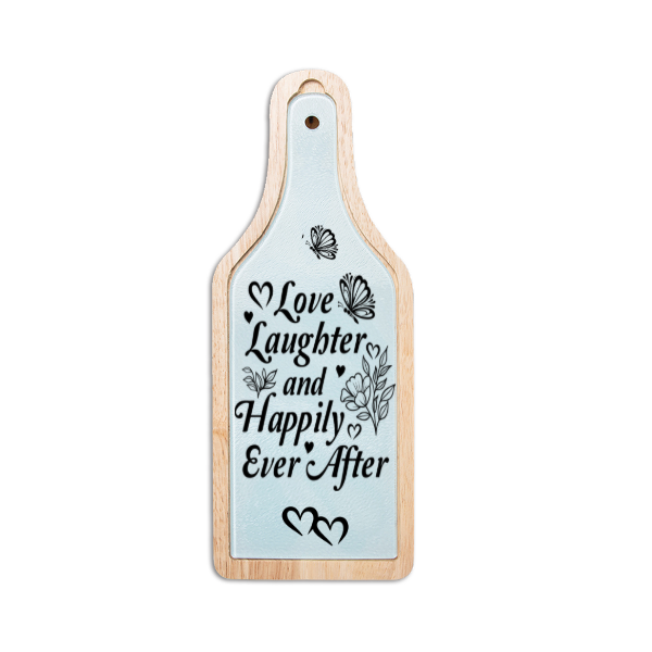 Wooden cutting board with engraved text and designs on a white background