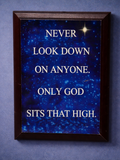 Framed motivational quote on a blue starry background
