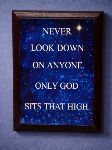 Framed motivational quote on a blue starry background