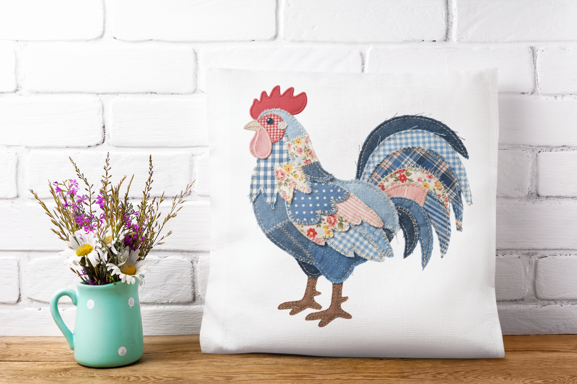 Decorative pillow with a rooster design on a white brick wall background