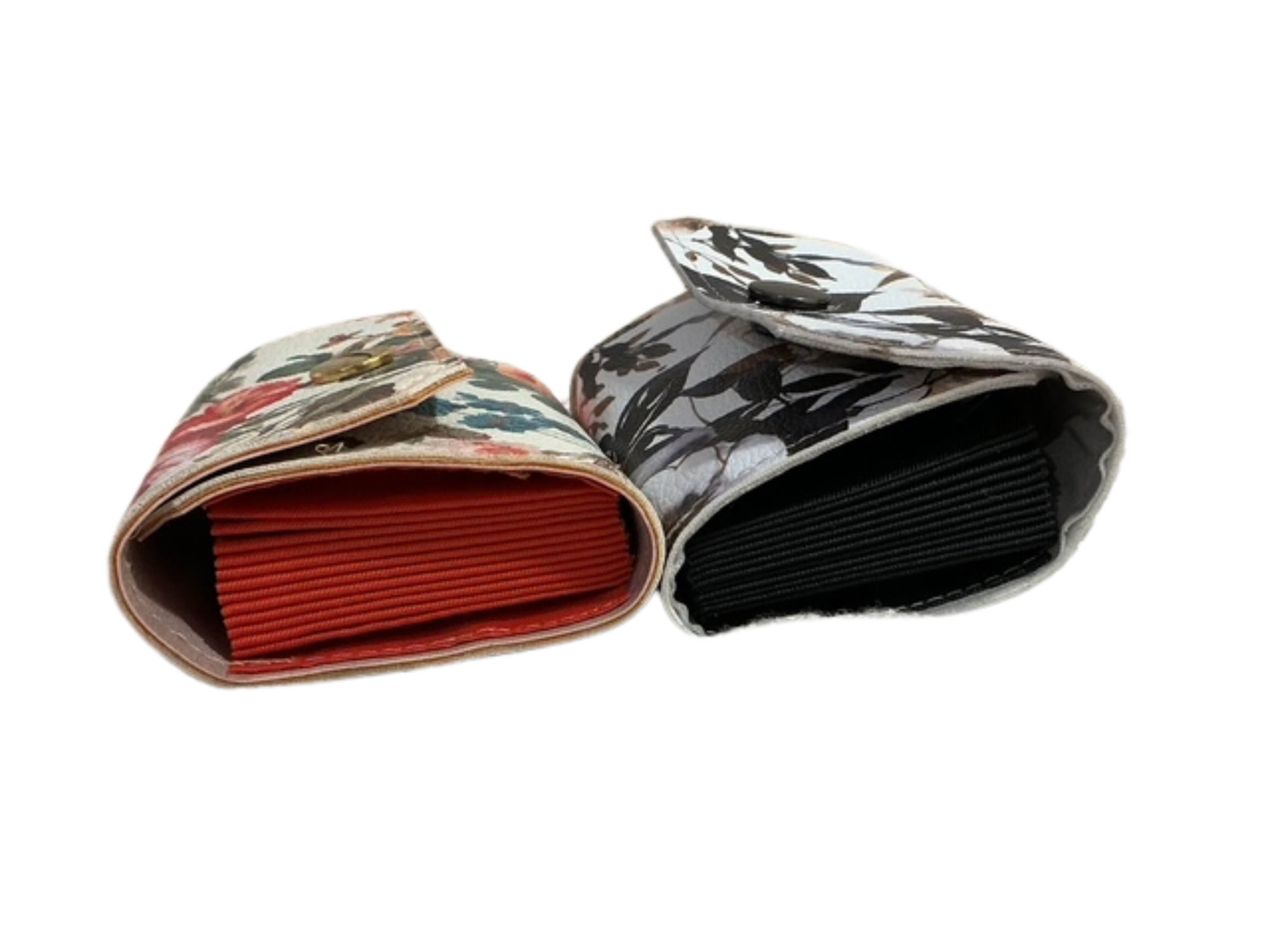 Two patterned notebooks with different cover designs on a white background