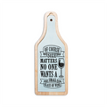 Wooden serving board with a humorous wine-themed message on a white background