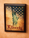 Framed artwork of the Statue of Liberty with stars and 'Sweet Land of Liberty' text on a textured background.