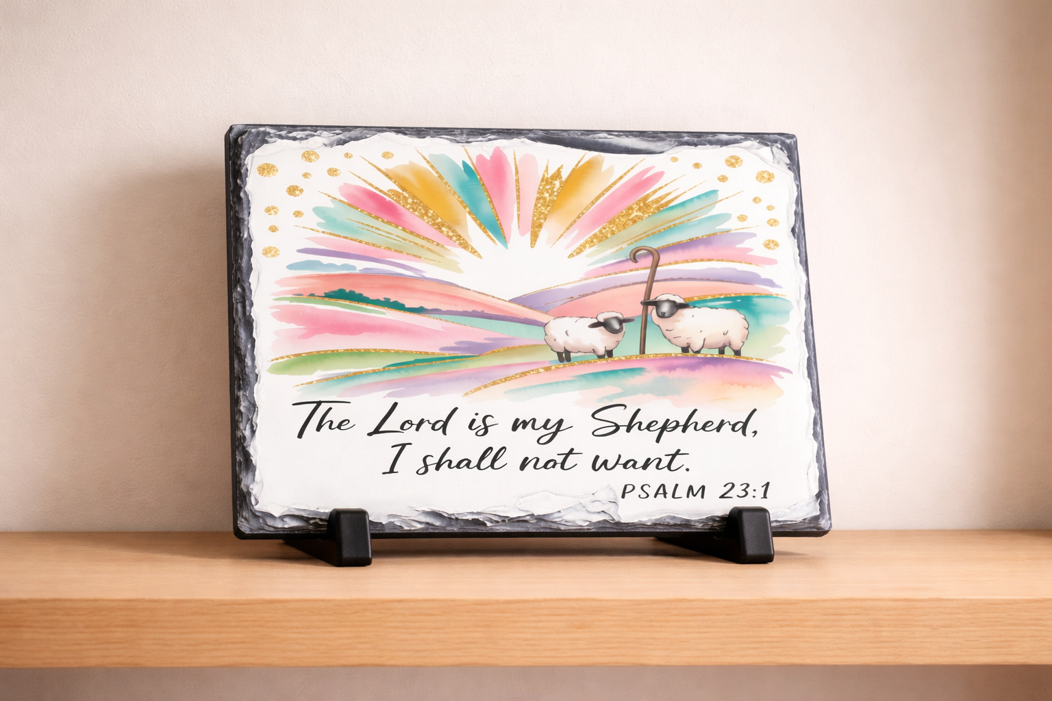 Decorative slate with sheep illustration and Bible verse on a wooden shelf.