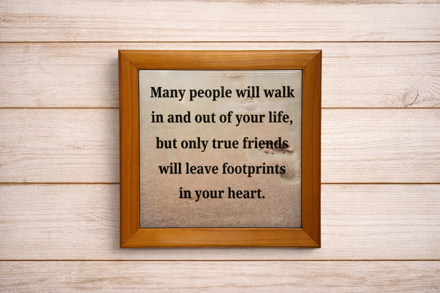 Framed quote on a wooden wall with a wooden frame.