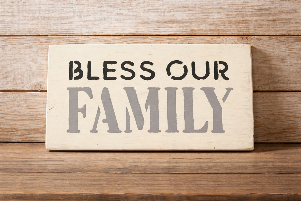 Wooden sign with 'Bless Our Family' text on a wooden background