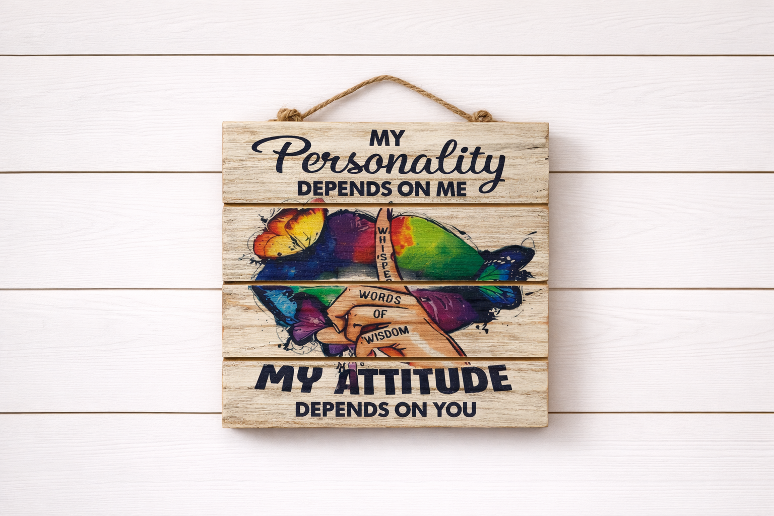 Wooden sign with colorful design and text on a white wooden background